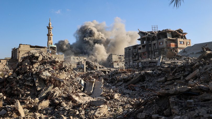 Smoke billows following an Israeli strike that targeted a building in the Bureij camp for Palestinian refugees in the central Gaza Strip on October 19, 2025.