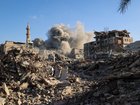 Smoke billows following an Israeli strike that targeted a building in the Bureij camp for Palestinian refugees in the central Gaza Strip on October 19, 2025.