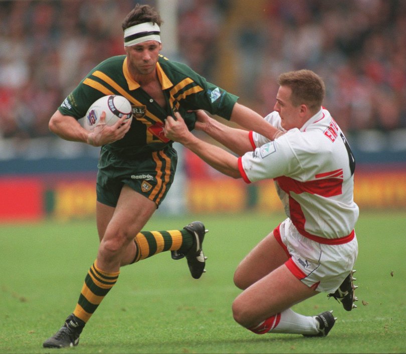 Mark Coyne brushes off Barrie-Jon Mather during the 1995 tour.