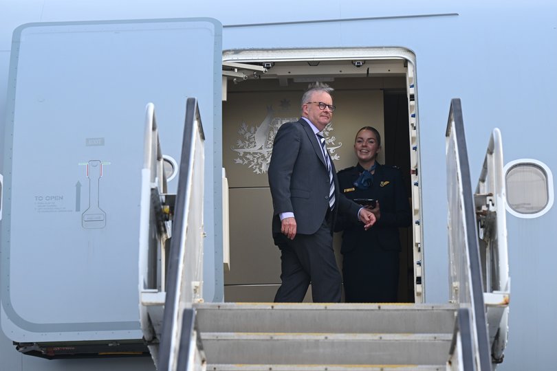 Australian Prime Minister Anthony Albanese boards a plane to travel to Washington for a meeting with US President Donald Trump, Brisbane, Sunday, October 19, 2025. (AAP Image/Lukas Coch) NO ARCHIVING