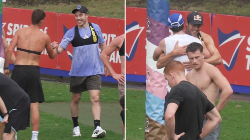Zach Merrett and Christian Petracca shake hands with Harry Sheezel and George Wardlaw.