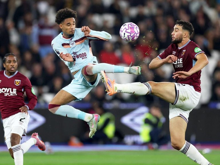 Brentford's Kevin Schade and West Ham United's Max Kilman battle for the ball.
