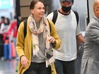 Hugh Jackman and Sutton Foster are spotted touching down in New York City. 