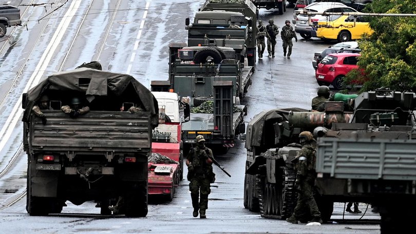 Fighters of Wagner private mercenary group are deployed in a street near the headquarters of the Southern Military District inRostov-on-Don, Russia.