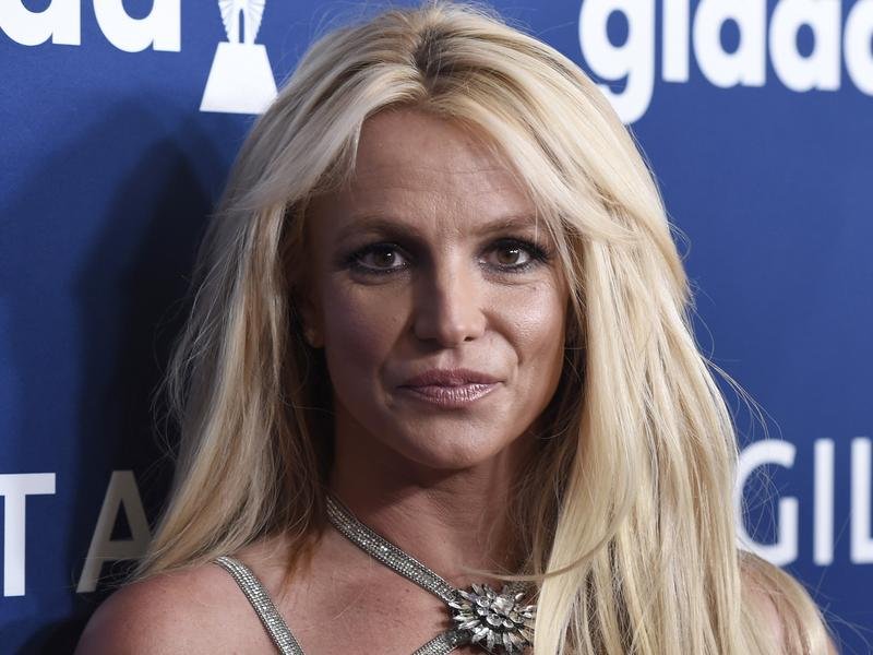 A tabloid reporter is writing a book about Britney Spears, and he says it will expose the "truth". (AP PHOTO)