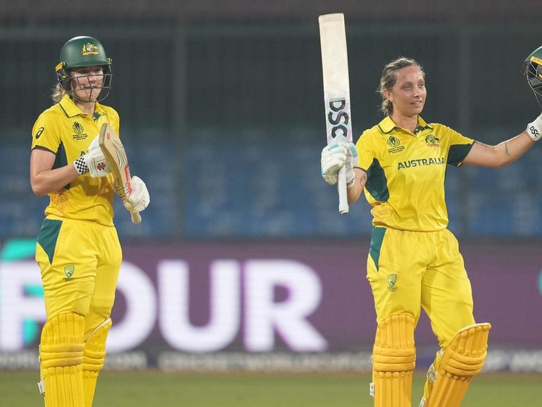 Ash Gardner celebrates her ton versus England, as fellow match-winner Annabel Sutherland applauds. (AP PHOTO)