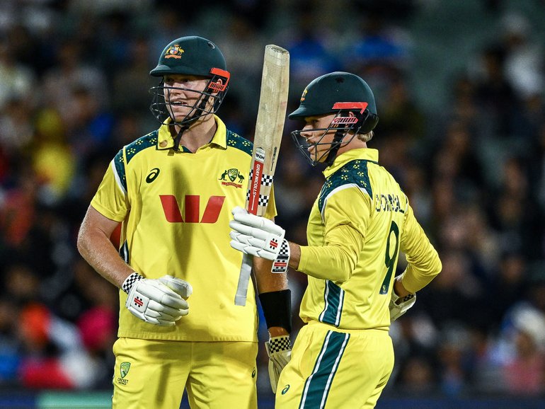 ADELAIDE, AUSTRALIA - OCTOBER 23: Cooper Connolly of Australia   celebrates making his half century with Mitchell Owen of Australia  during game two in the One Day International series between Australia and India at Adelaide Oval on October 23, 2025 in Adelaide, Australia. (Photo by Mark Brake/Getty Images)