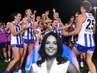 Ash Riddell of the Kangaroos embraces Jasmine Garner after last year’s grand final.
