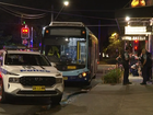A man has been arrested after allegedly stabbing another passenger in a random attack on a bus.