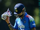 Virat Kohli of India leaves the ground after getting out.