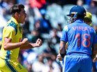 Xavier Bartlett celebrates his dismissal of Indian great Virat Kohli.