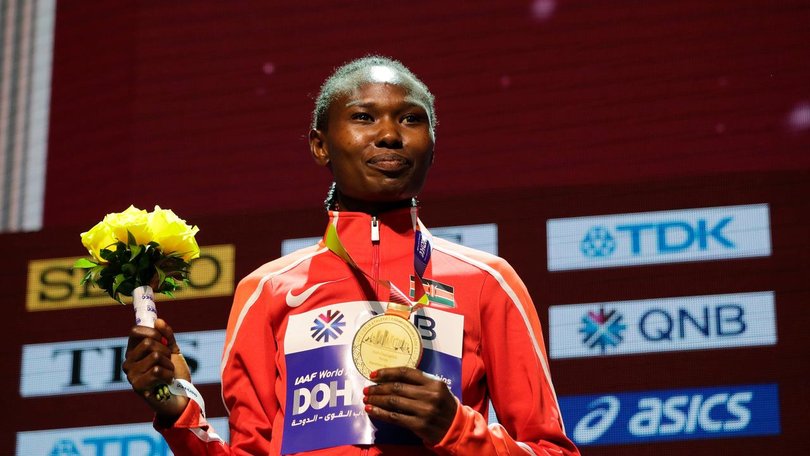 Kenya's Ruth Chepngetich, here with her 2019 world marathon gold, has been banned for three years.