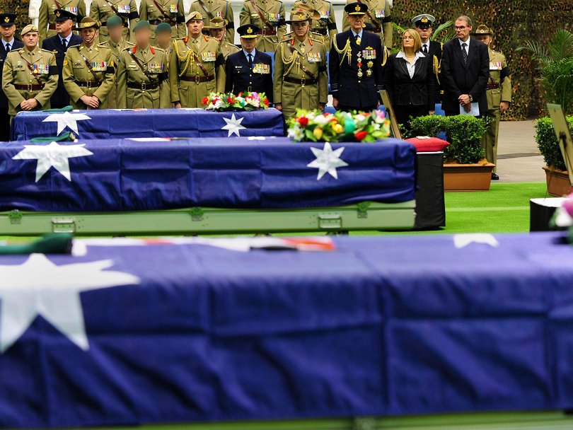 A ceremony at Richmond Air Force Base to greet the bodies of privates Tim Aplin, Ben Chuck and Scott Palmer of the 2nd Commando Regiment.