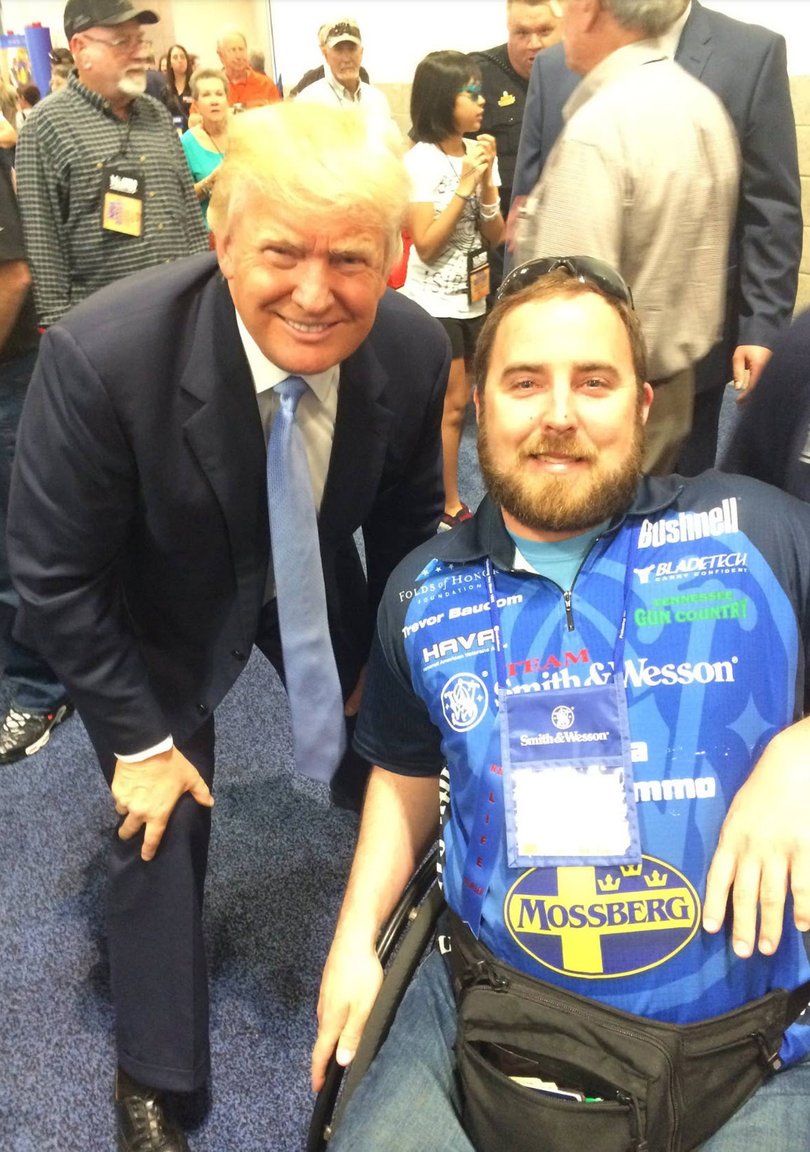 Former US Army helicopter pilot Travor Baucom with President Donald Trump when he was running for office in 2015.