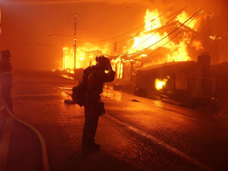 The Palisades wildfire levelled some 6000 structures, and caused $US150 billion in property damage. (EPA PHOTO)