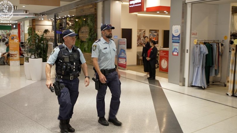 NSW Police conducting a wanding operation in Campbelltown.