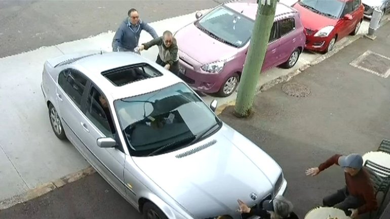 Astonishing CCTV footage has emerged of the moment a car crashed into a Sydney café, sending a woman to hospital. 