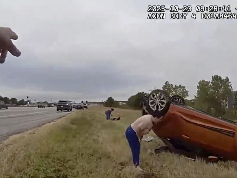 A police officer's body-worn camera captured the frantic efforts to save a trapped baby. (AP PHOTO)