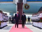 US President Donald Trump walks with Malaysia's Prime Minister Anwar Ibrahim as he arrives at Kuala Lumpur, Malaysia.