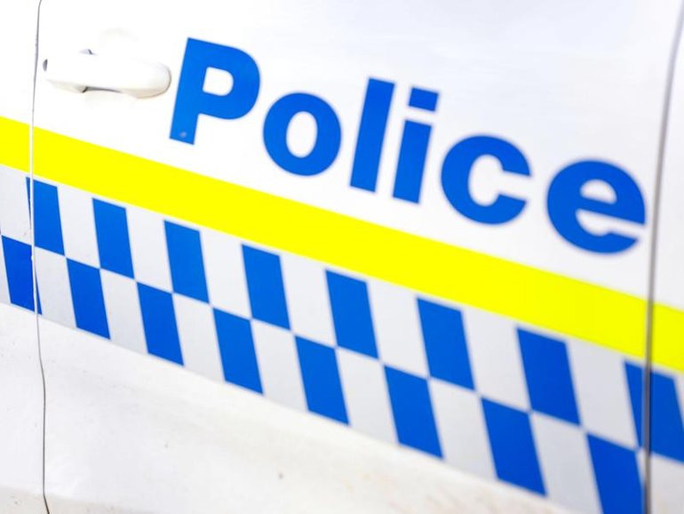 A woman has been charged with attempted murder after allegedly shooting at Tasmanian police.