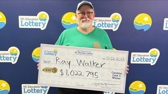 Ray Walker paid for a $1 lotto ticket, but walked away with more than $1 million.