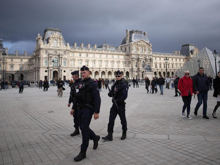 Two suspects are being questioned by police over a heist at the Louvre museum. (AP PHOTO)