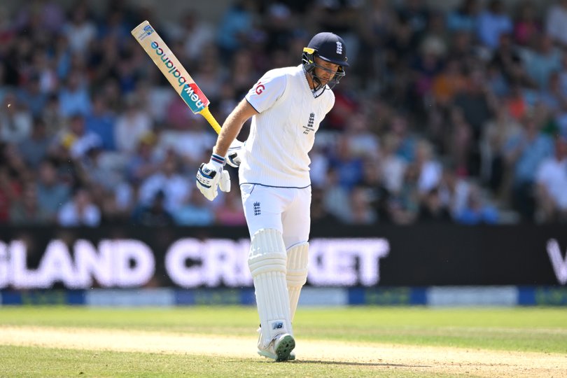 Joe Root leaves the field after being dismissed by Pat Cummins in 2023.