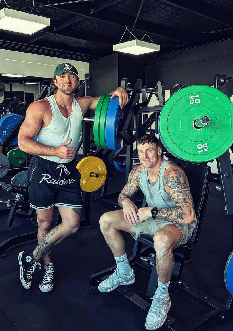 Mathieson and his good mate Mitch Robinson in the gym.