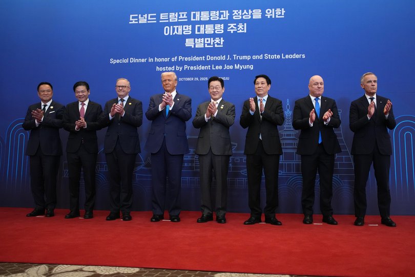 (L-R) Prime Minister of Thailand, Anutin Charnvirakul, Prime Minister of Singapore, Lawrence Wong, Prime Minister of Australia, Anthony Albanese, U.S. President, Donald Trump, South Korean President, Lee Jae Myung, President of Vietnam, Luong Cuong, Prime Minister of New Zealand, Christopher Luxon and Prime Minister of Canada, Mark Carney clap as they pose for a group photo.