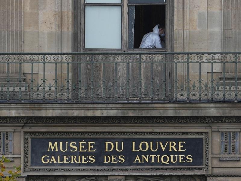 Two suspects have been arrested over a brazen robbery at the world's most-visited museum. (AP PHOTO)