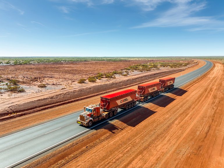 A MinRes truck on the upgraded Onslow Iron haul road.