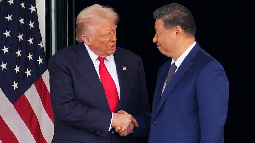 President Donald Trump and Chinese President Xi Jinping shake hands as they depart following a bilateral meeting at Gimhae Air Base on October 30, 2025 in Busan, South Korea.