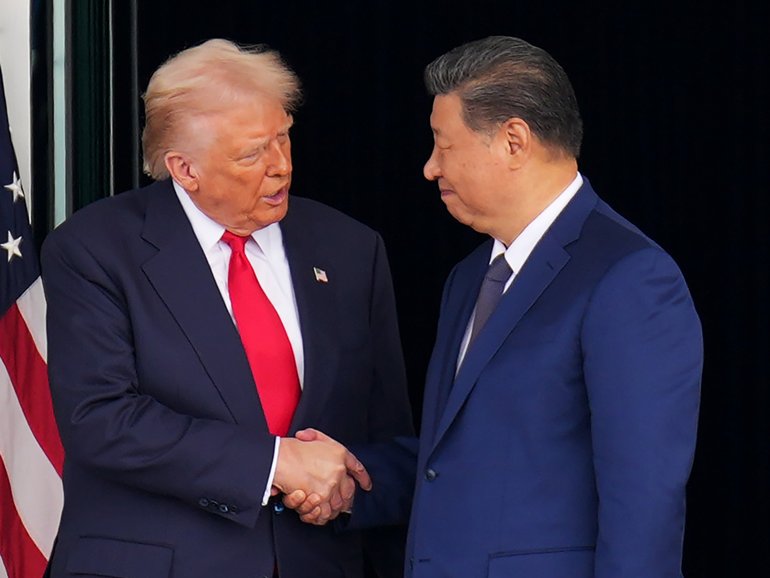 President Donald Trump and Chinese President Xi Jinping shake hands as they depart following a bilateral meeting at Gimhae Air Base on October 30, 2025 in Busan, South Korea.
