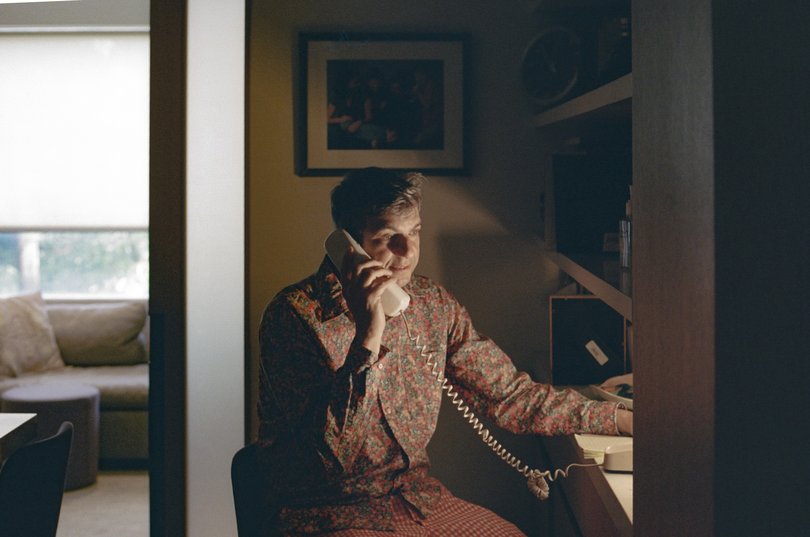 Author AJ Jacobs uses a landline phone in New York, Sept. 29, 2025.