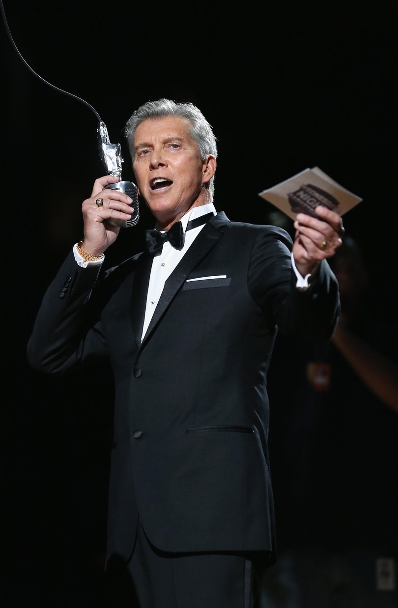 Michael Buffer introduces the Charlotte Bobcats before their game against the New York Knicks in 2012.