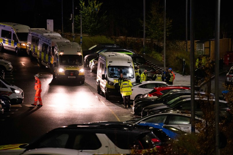 Police and other emergency responders attend to Huntingdon Station.