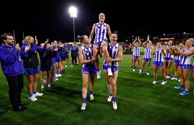 Jasmine Garner was chaired off after her 100th game. 