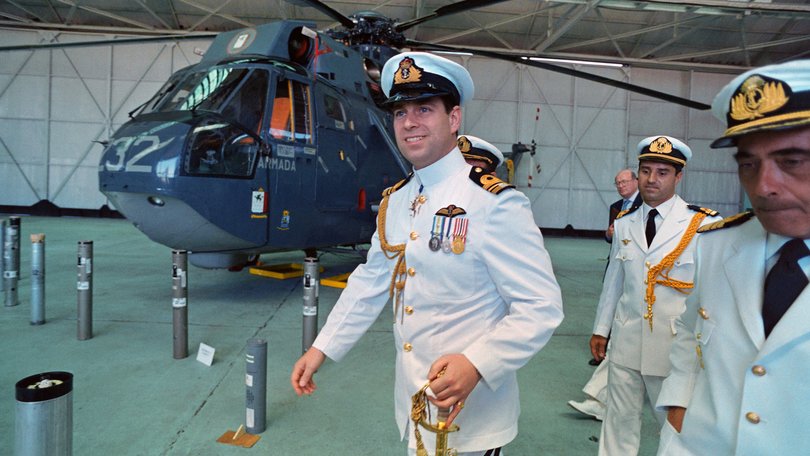 Britain's Prince Andrew with his medals from the Falklands while inspecting the Comandante Espora Naval Air Base at Bahia Blanca in 1994.