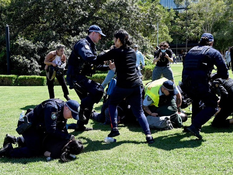 Protesters and NSW Police clash during an attempted blockade by the Palestine Action Group of the Indo-Pacific Weapons expo at the ICC Sydney.
