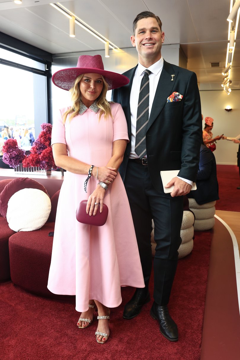 MELBOURNE, AUSTRALIA - NOVEMBER 04: Emma Hawkins and Tom Hawkins pose for a photo during 2025 Melbourne Cup Day at Flemington Racecourse on November 04, 2025 in Melbourne, Australia. (Photo by Sam Tabone/Getty Images)