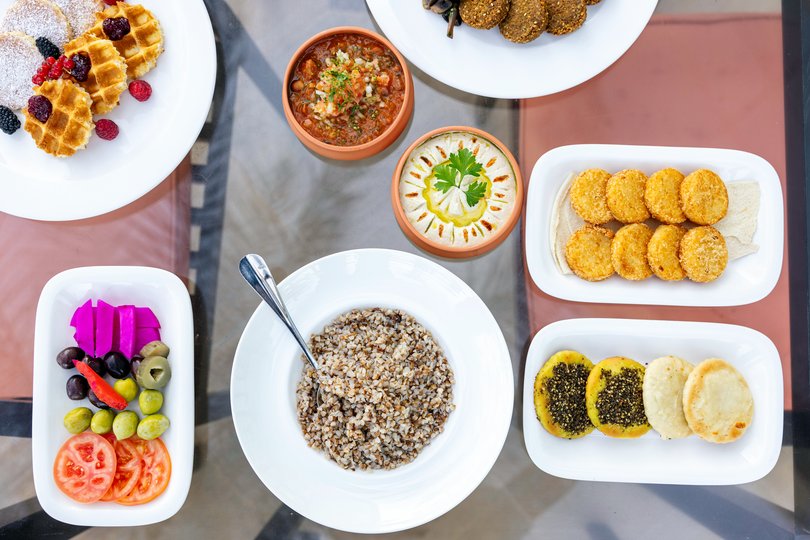 Breakfast at the Fairmont hotel in Ajman includes both kasha and zaatar manakish flatbread, reflecting the diversity of its guests.