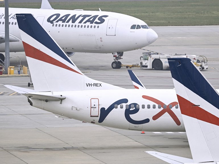 Rex Airlines Boeing 737 planes lay idle on the tarmac at Melbourne's Tullamarine Airport.