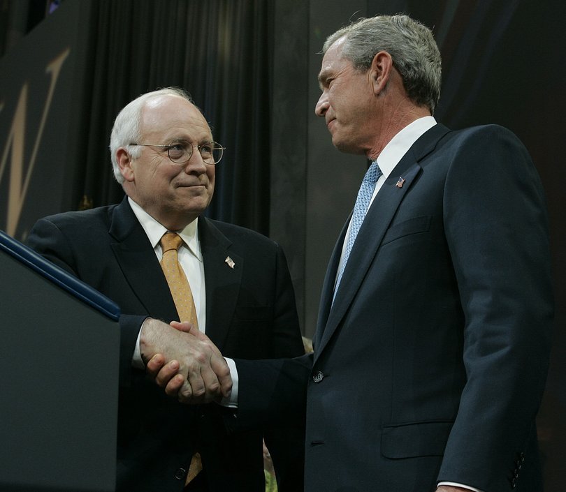 FILE — President George W. Bush and Vice President Dick Cheney shake hands on their victorious re-election night in Washington, on Nov, 3, 2004.