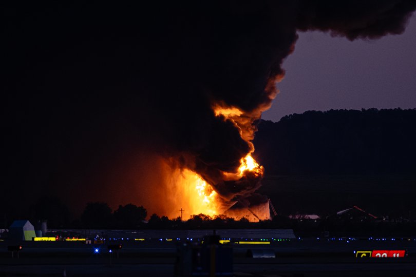A fireball erupts Louisville International Airport, Tuesday, Nov. 4, 2025.