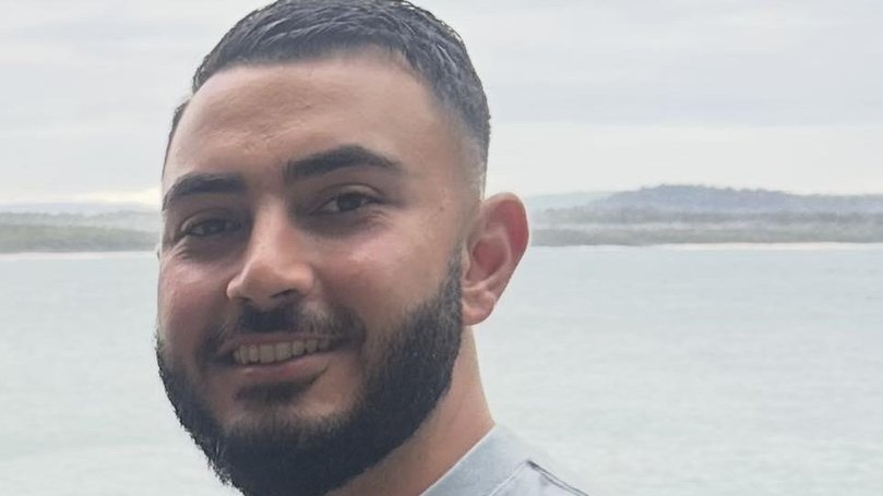 Two men have been charged with murdering Sydney plumber John Versace, who was shot dead after being mistaken for a gangland figure.