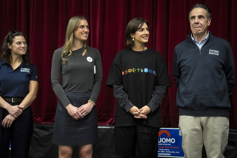 Former Governor Andrew Cuomo of New York, an independent candidate for mayor of New York City, is joined by his daughters at a campaign event.