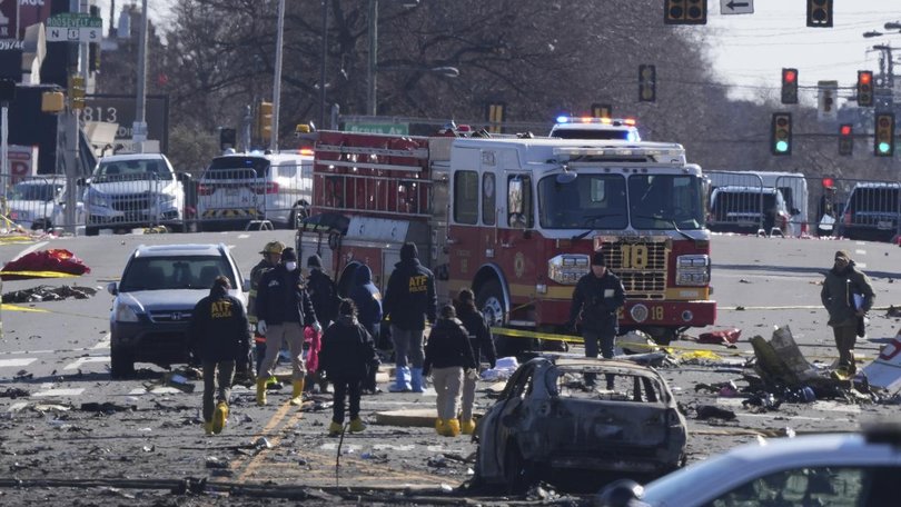 Authorities sifted through burned cars and debris after a plane crashed in Philadelphia.