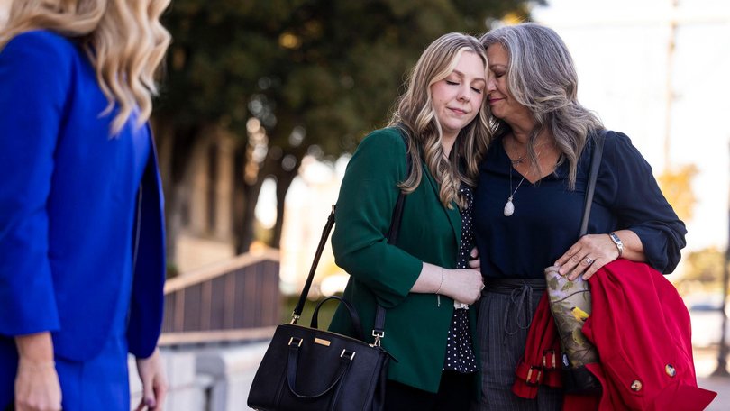 Abigail Zwerner shares a moment with her mother Julie Zwerner after winning her lawsuit against former assistant principal, Ebony Parker.