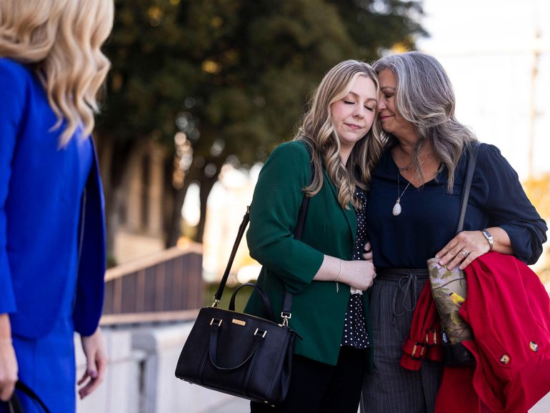 Abigail Zwerner shares a moment with her mother Julie Zwerner after winning her lawsuit against former assistant principal, Ebony Parker.