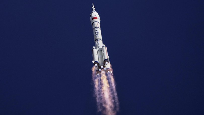 China's Long March 2F rocket, carrying the three astronauts for the Shenzhou 20 manned space mission, heads for the space station.